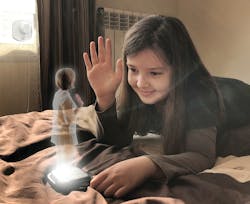 Figure 4. Holographic telepresence Figure 4. Holographic telepresence