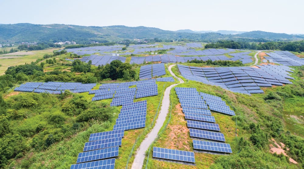 Aerial view of a hillside solar farm (Image source: Varnish Software)