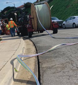 Figure 1. Netly used microtrenching along the curb to install 6 microducts. Figure 1. Netly used microtrenching along the curb to install 6 microducts.