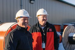 (left to right) Joe and Mark Petersen, OSP Engineering Manager, discussing construction plans. (left to right) Joe and Mark Petersen, OSP Engineering Manager, discussing construction plans.