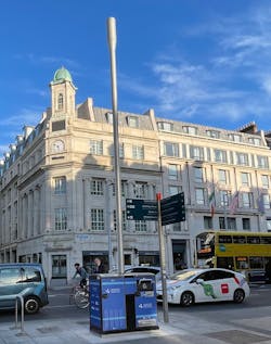 Figure 1. New small cell deployments in Dublin included a smart connected waste and recycling bin, the Big Belly Telebelly, which conceals radios, power, and transmission equipment discreetly within a sensor-equipped enclosure. (Photo source: Alpha Wireless) Figure 1. New small cell deployments in Dublin included a smart connected waste and recycling bin, the Big Belly Telebelly, which conceals radios, power, and transmission equipment discreetly within a sensor-equipped enclosure. (Photo source: Alpha Wireless)