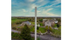 Figure 2. Pictured is a multi-band, tri-sector antenna deployed by Cellnex in the village of Vicarstown, County Laois, Ireland. (Photo source: Alpha Wireless)