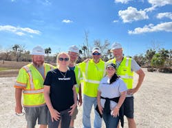 Julie with Verizon drone pilots. Julie with Verizon drone pilots.