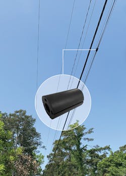 Figure 1. Sherpa device connecting drop cables to strand.