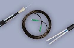 Figure 2. Typical flat and round fiber drop cables. Figure 2. Typical flat and round fiber drop cables.