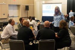 Publisher Janice Oliva converses with the Honorees at the Awards breakfast. Publisher Janice Oliva converses with the Honorees at the Awards breakfast.