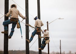 Hill Country Internet and Phone Service (HCTC), Ingram, Texas, linemen installing fiber. Hill Country Internet and Phone Service (HCTC), Ingram, Texas, linemen installing fiber.