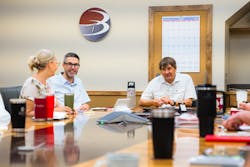 CFO Stacy Mueller, COO Joe Fanguy, and Williams in a leadership meeting. CFO Stacy Mueller, COO Joe Fanguy, and Williams in a leadership meeting.