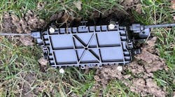 Successful fiber drop cable repair waiting to be buried. Successful fiber drop cable repair waiting to be buried.