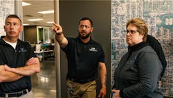Janelle, Brian Orwig, OSP Project Engineer (center), and Travis Radnor, Sr. Director of Governmental Policy and Market Analysis (left), discussing fiber expansion plans in Kearney, Nebraska. Janelle, Brian Orwig, OSP Project Engineer (center), and Travis Radnor, Sr. Director of Governmental Policy and Market Analysis (left), discussing fiber expansion plans in Kearney, Nebraska.