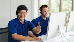 Business Background Of Asian And Caucasian Male Customer Service Agents On Telephone Service To Customers At Help Desk Call Center And Customer Service Operation Center Business Background Of Asian And Caucasian Male Customer Service Agents On Telephone Service To Customers At Help Desk Call Center And Customer Service Operation Center