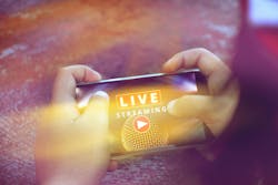 Two Hand Holding Smart Phone With Live Streaming Concert ,live Streaming Word And Microphone On Screen Mobile Phone, Music Online Concept Two Hand Holding Smart Phone With Live Streaming Concert ,live Streaming Word And Microphone On Screen Mobile Phone, Music Online Concept