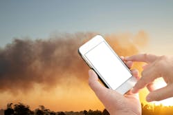 Conception Of Emergency Notification With Technology, Fire With Black Smoke Floated On Sunset Sky Conception Of Emergency Notification With Technology, Fire With Black Smoke Floated On Sunset Sky