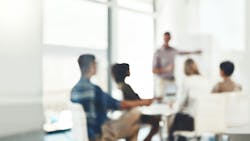 Sem-obscured image of team memebers in a meeting. Sem-obscured image of team memebers in a meeting.