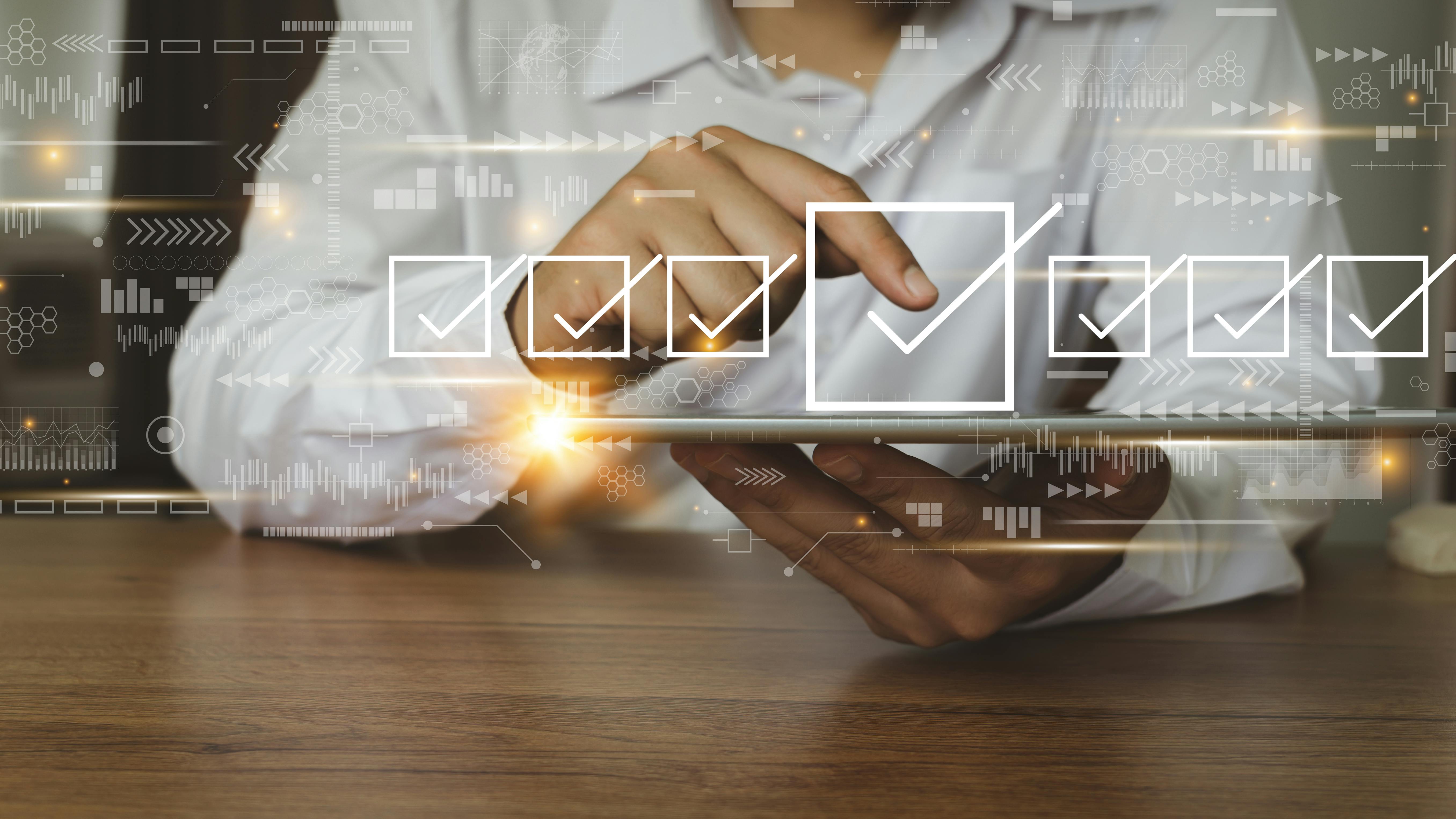 A person taking a survey on a tablet.